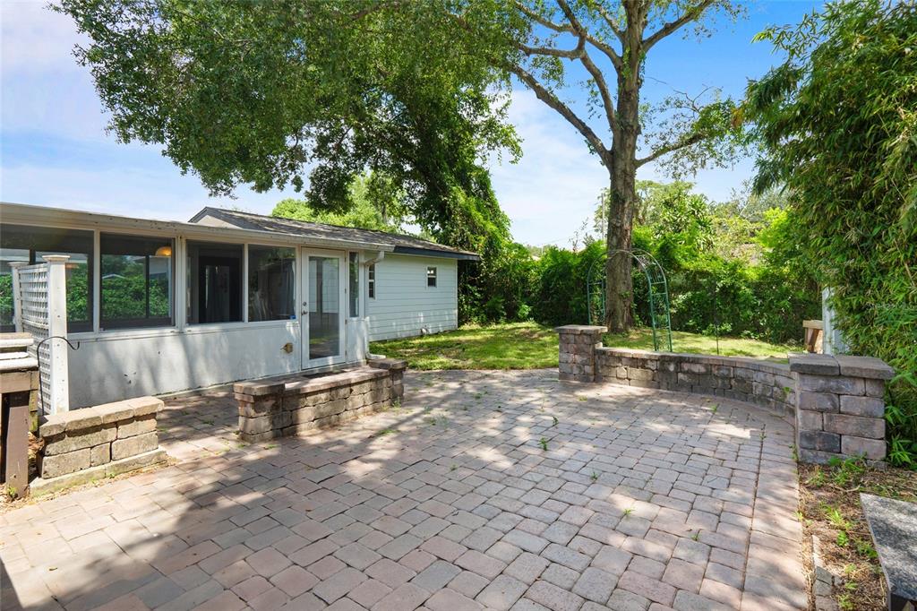 1603 Tulane Street Orlando, FL 32804 - Photo 18 of 27 a view of a house with backyard and a tree