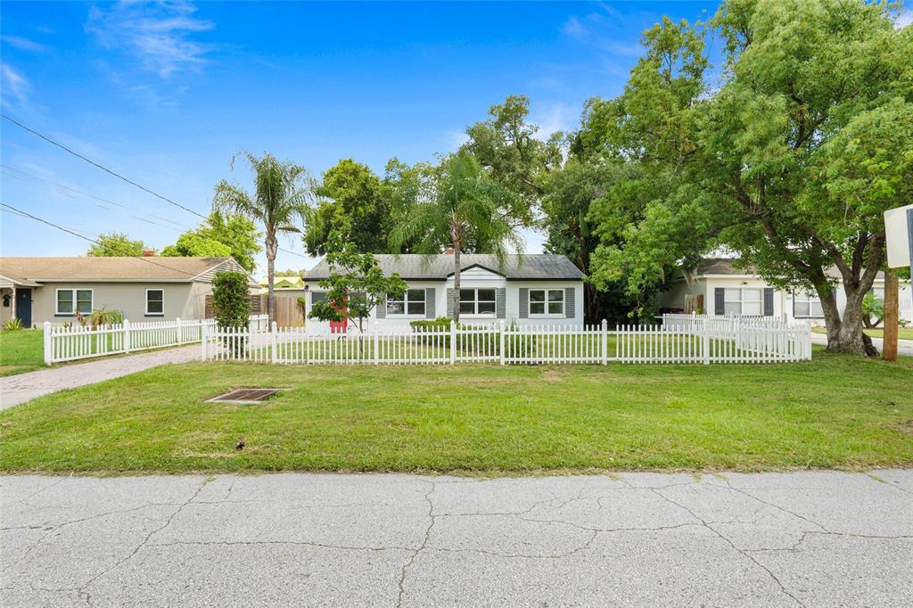 1603 Tulane Street Orlando, FL 32804 - Photo 2 of 27 a front view of a house with a garden