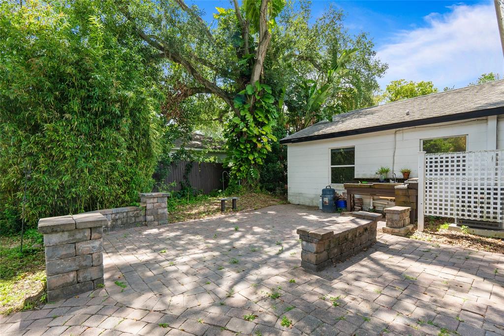 1603 Tulane Street Orlando, FL 32804 - Photo 23 of 27 a view of a backyard with furniture and tree