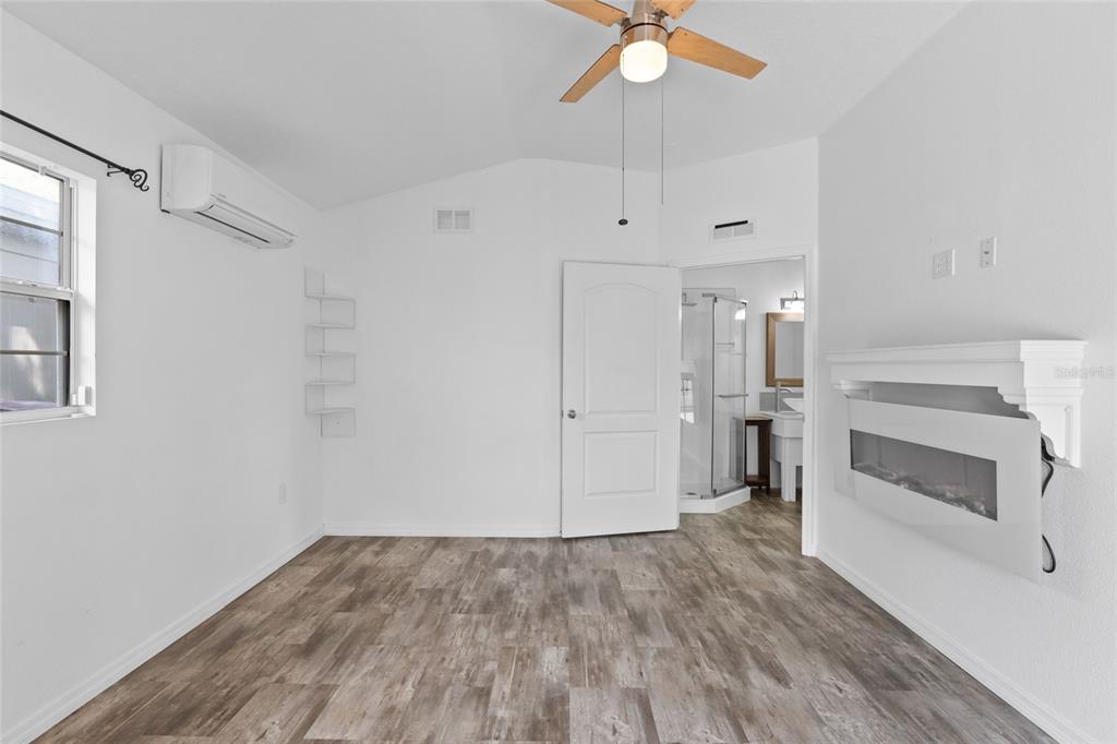 1603 Tulane Street Orlando, FL 32804 - Photo 9 of 27 a view of empty room with wooden floor and window