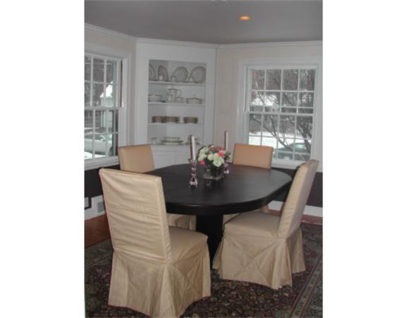 10 Sprague Road Wellesley, MA 02481 - Photo 4 of 18 a view of a dining room with a table and chairs