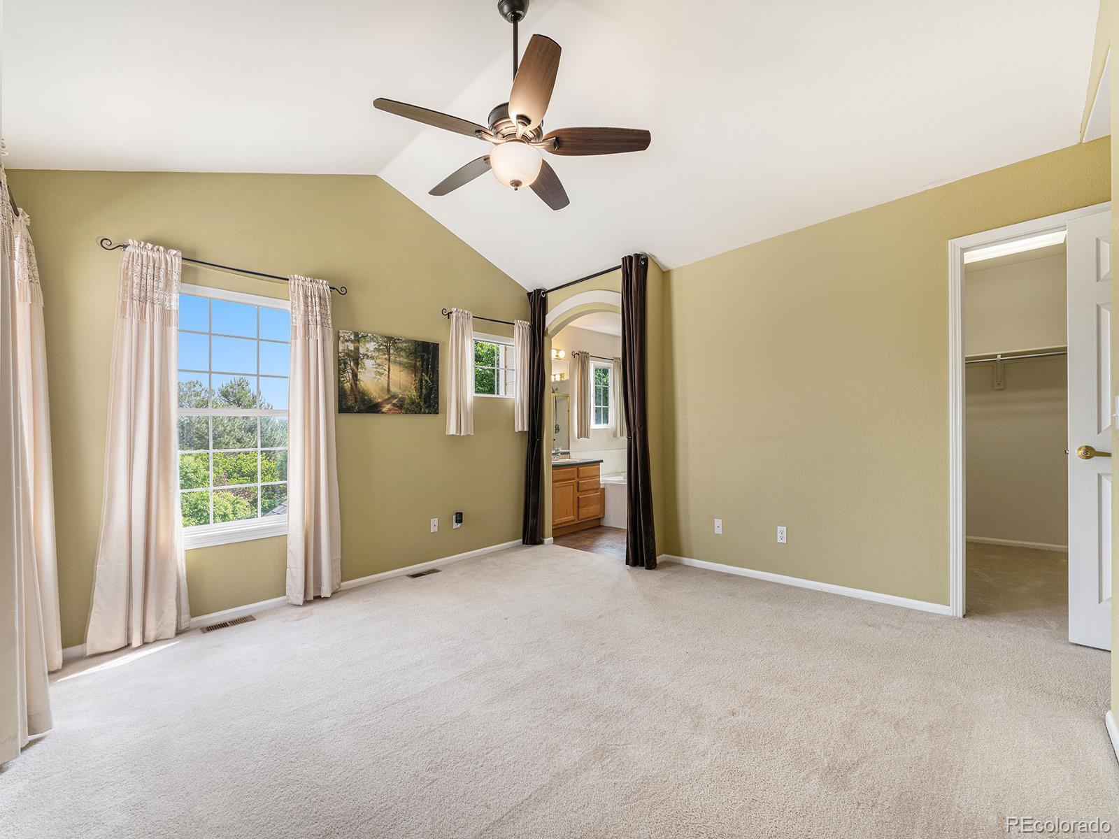 9911 Sylvestor Road Highlands Ranch, CO 80129 - Photo 25 of 31 a view of an empty room with a window