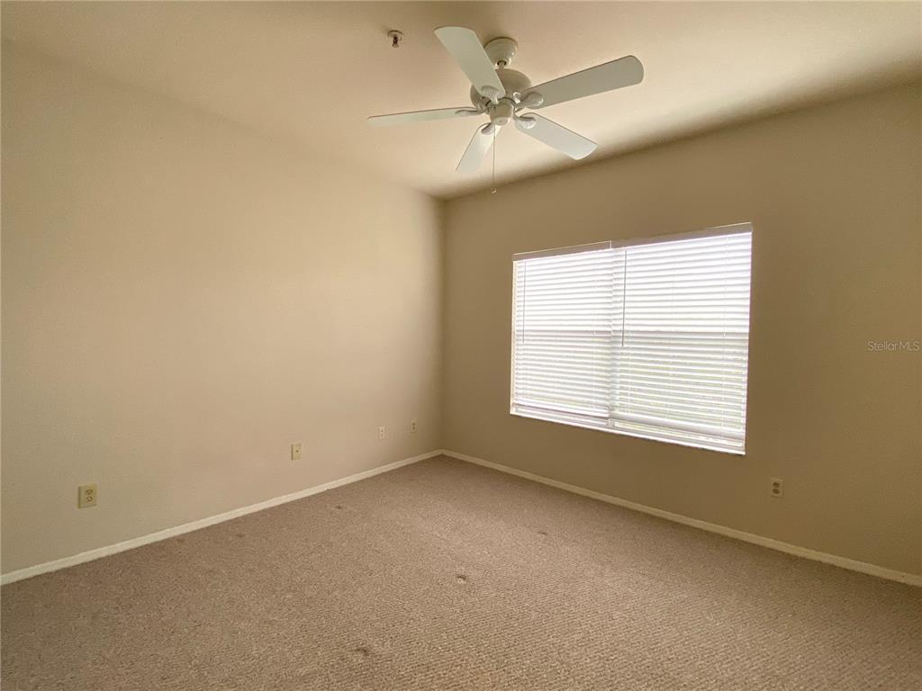 823 Camargo Way, Unit 302 Altamonte Springs, FL 32714 - Photo 11 of 19 an empty room with a window