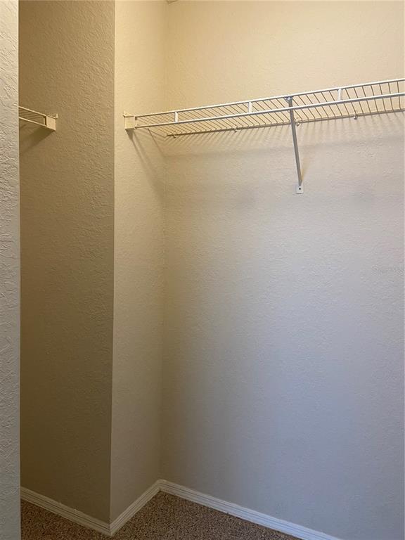 823 Camargo Way, Unit 302 Altamonte Springs, FL 32714 - Photo 13 of 19 a view of small space with racks on the wall