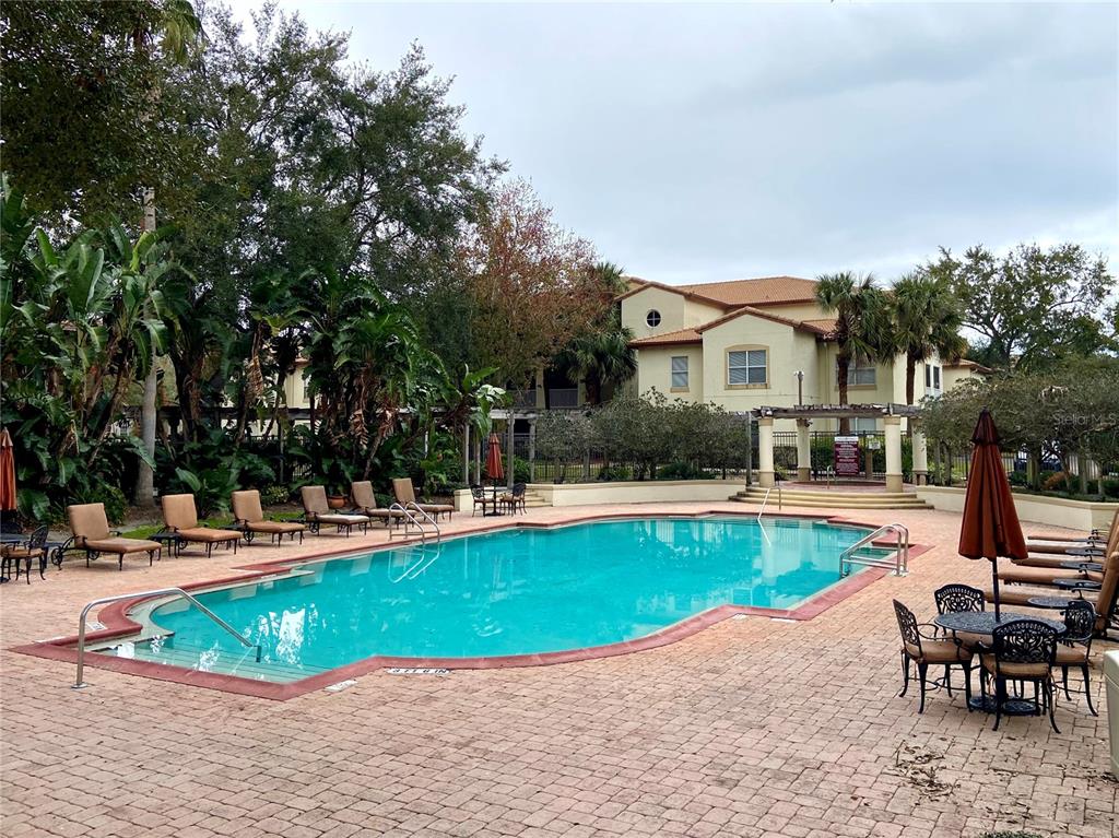 823 Camargo Way, Unit 302 Altamonte Springs, FL 32714 - Photo 18 of 19 a view of a house with swimming pool and sitting area