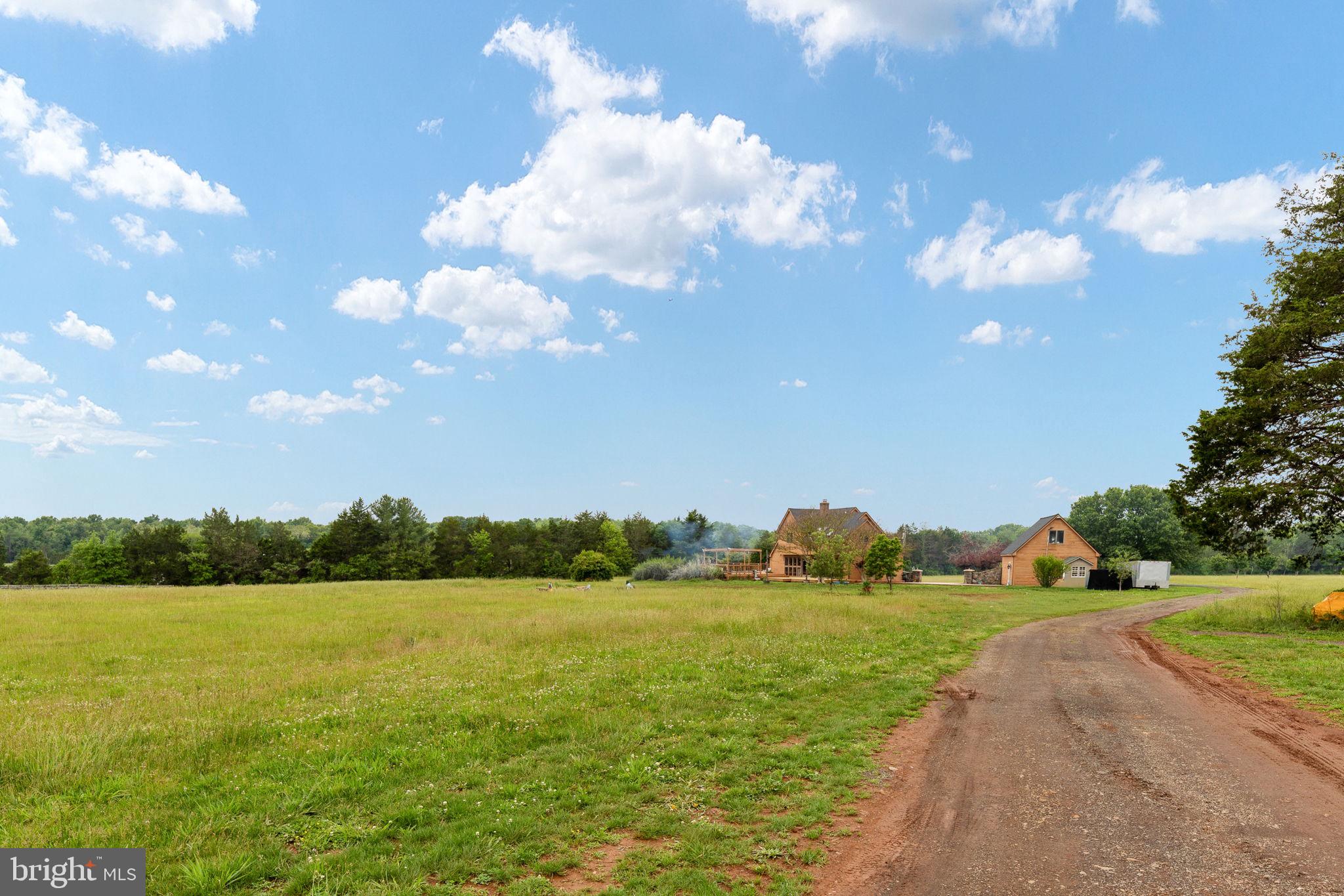 6119 Beach Road Midland, VA 22728 - Photo 61 of 98 a view of a lake and yard in back