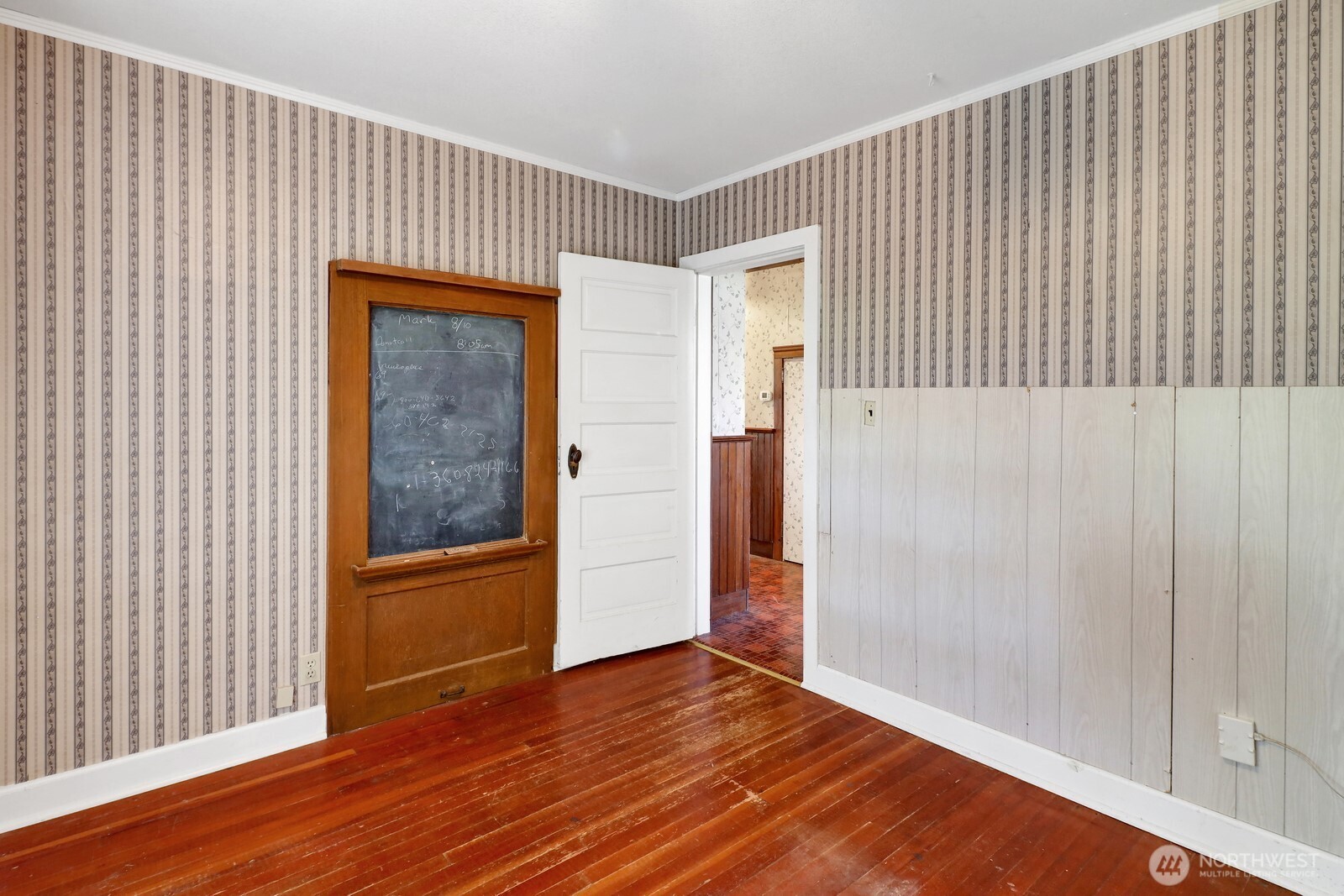 8172 Van Buren Road Everson, WA 98247 - Photo 15 of 33 a view of an empty room with wooden floor