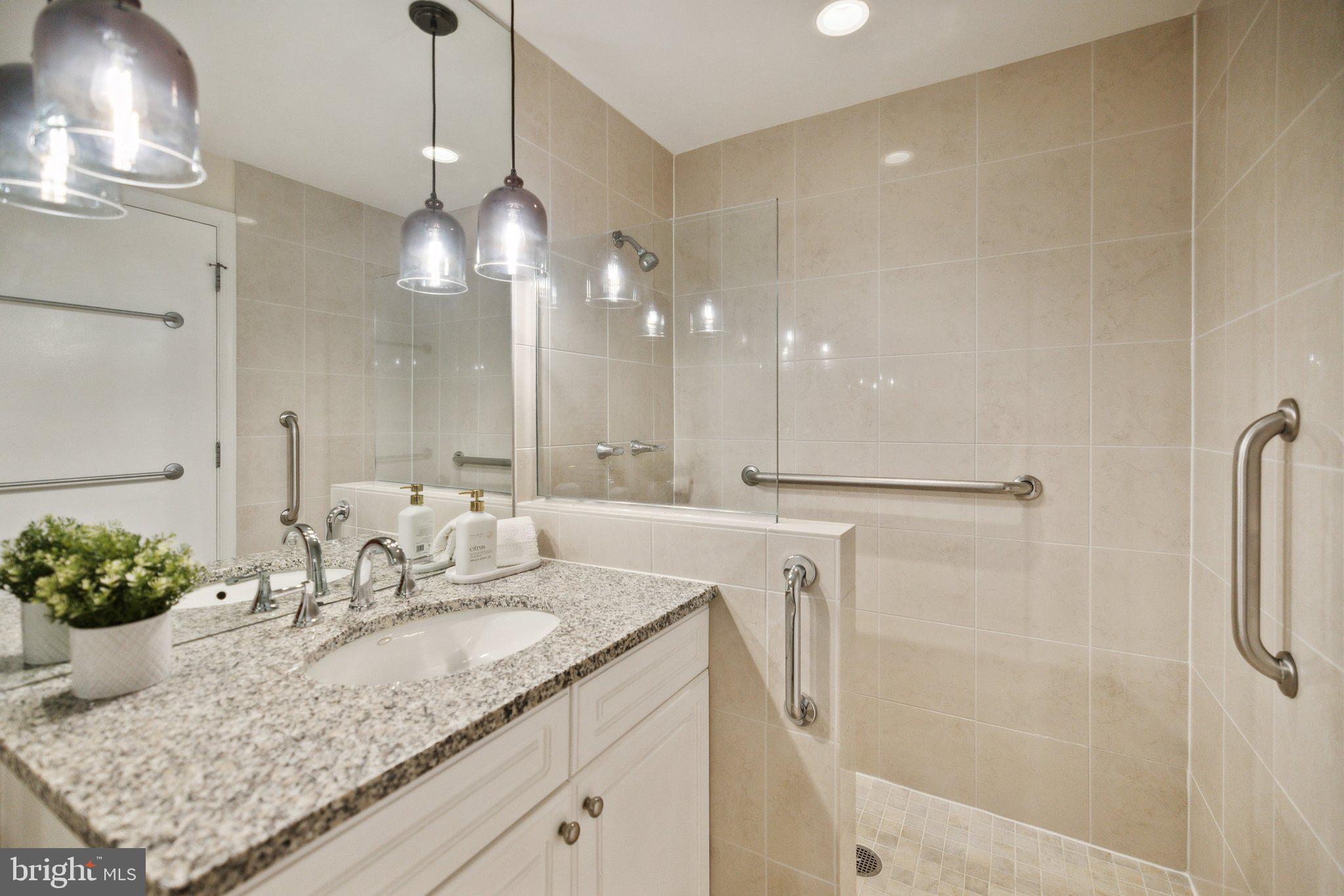 675 E Street Northwest, Unit 200 Washington, DC 20004 - Photo 13 of 28 Primary Bathroom