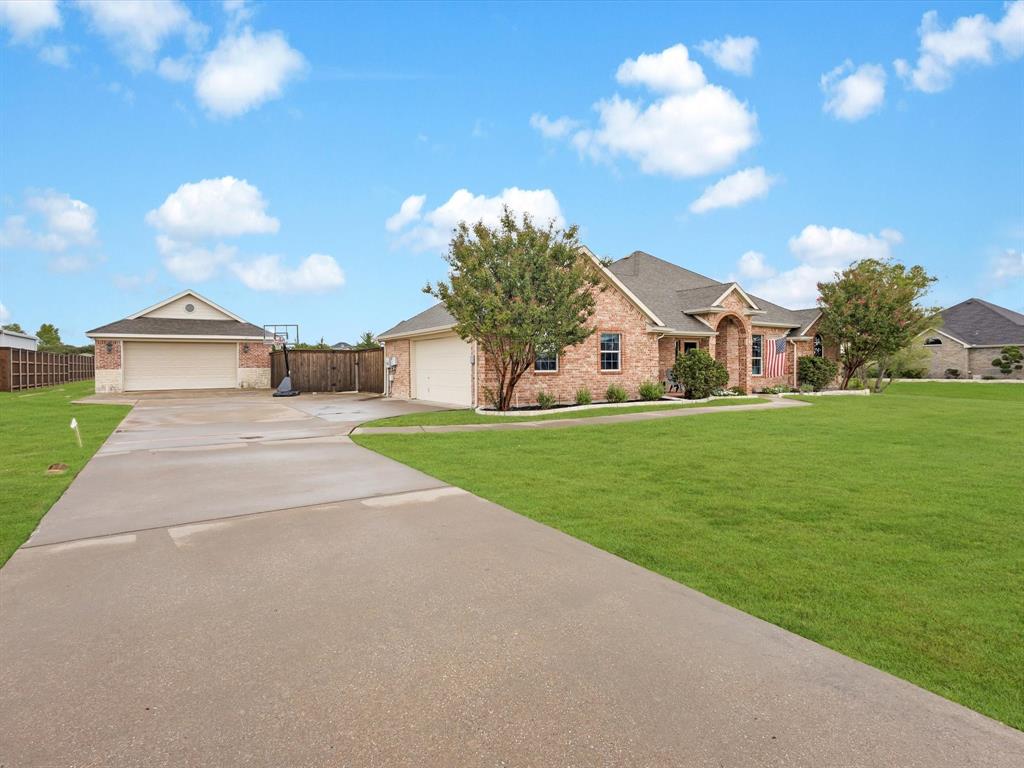 272 Winding Ridge Lane Rockwall, TX 75032 - Photo 1 of 1 a view of a house with a big yard