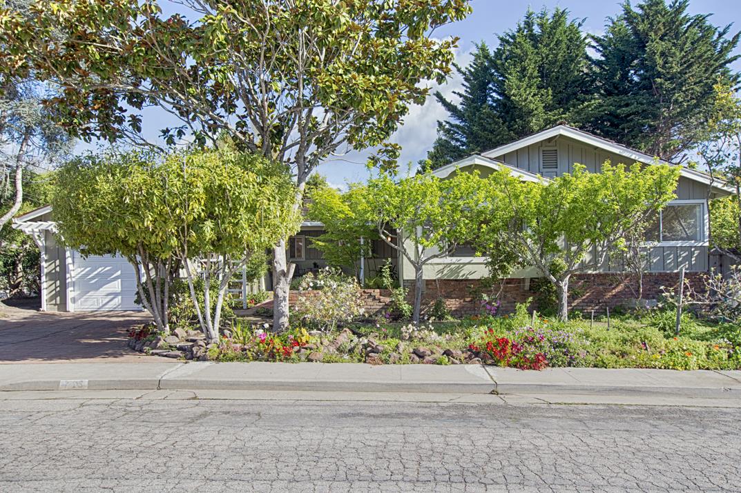 716 Rosedale Avenue Capitola, CA 95010 - Photo 17 of 19 a backyard of a house with lots of green space
