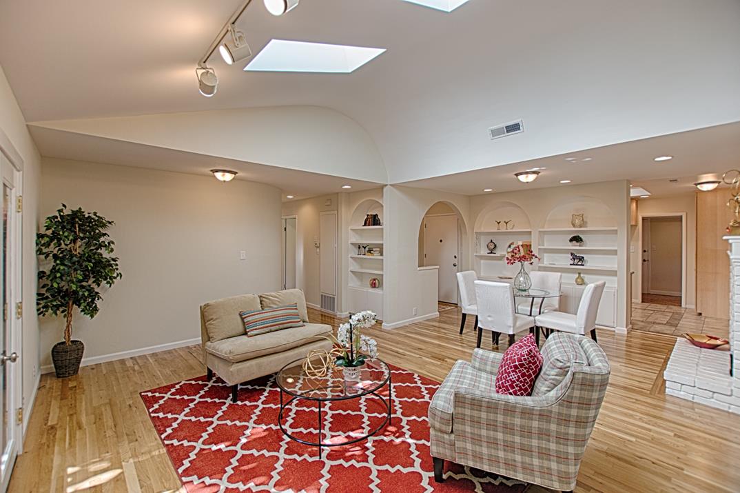 716 Rosedale Avenue Capitola, CA 95010 - Photo 2 of 19 a living room with furniture and a potted plant