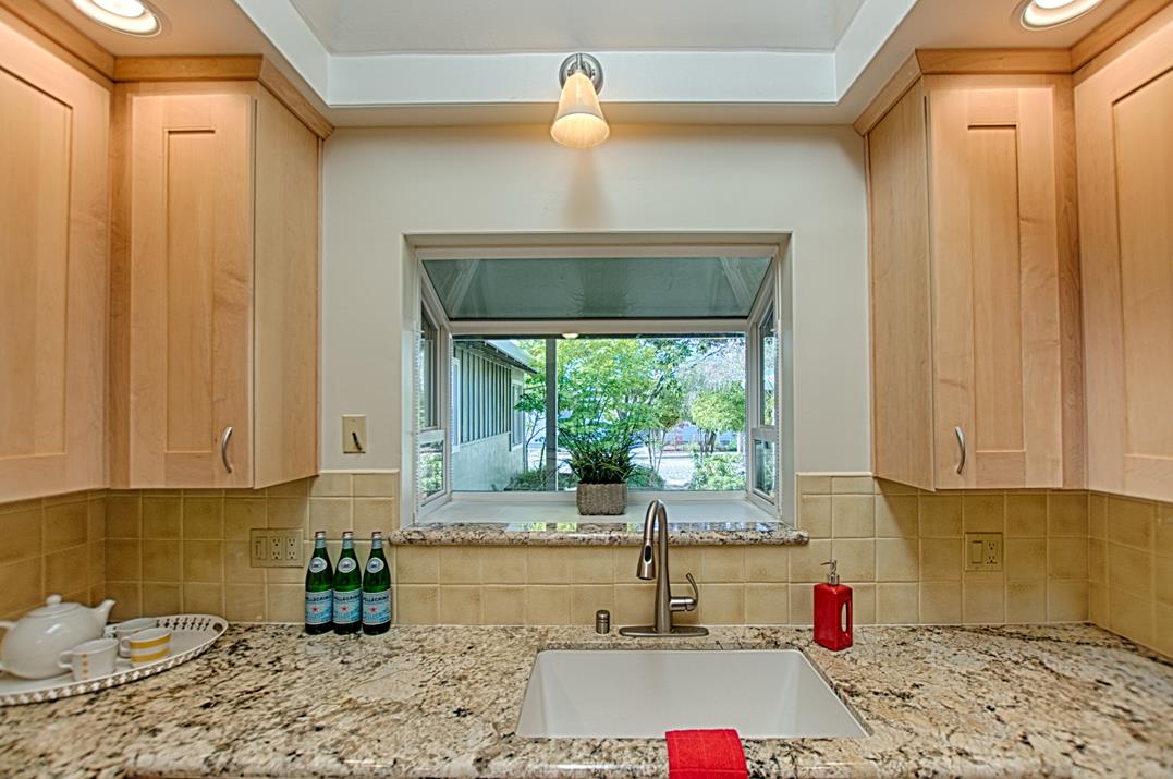 716 Rosedale Avenue Capitola, CA 95010 - Photo 5 of 19 a kitchen with a sink and a window