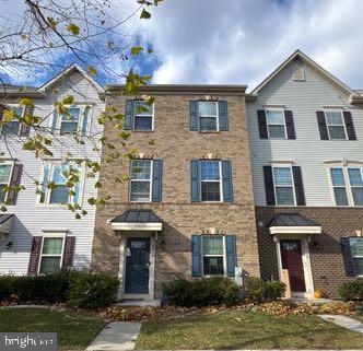 10018 Sandy Run Road Middle River, MD 21220 - Photo 1 of 17 a front view of a house with garden