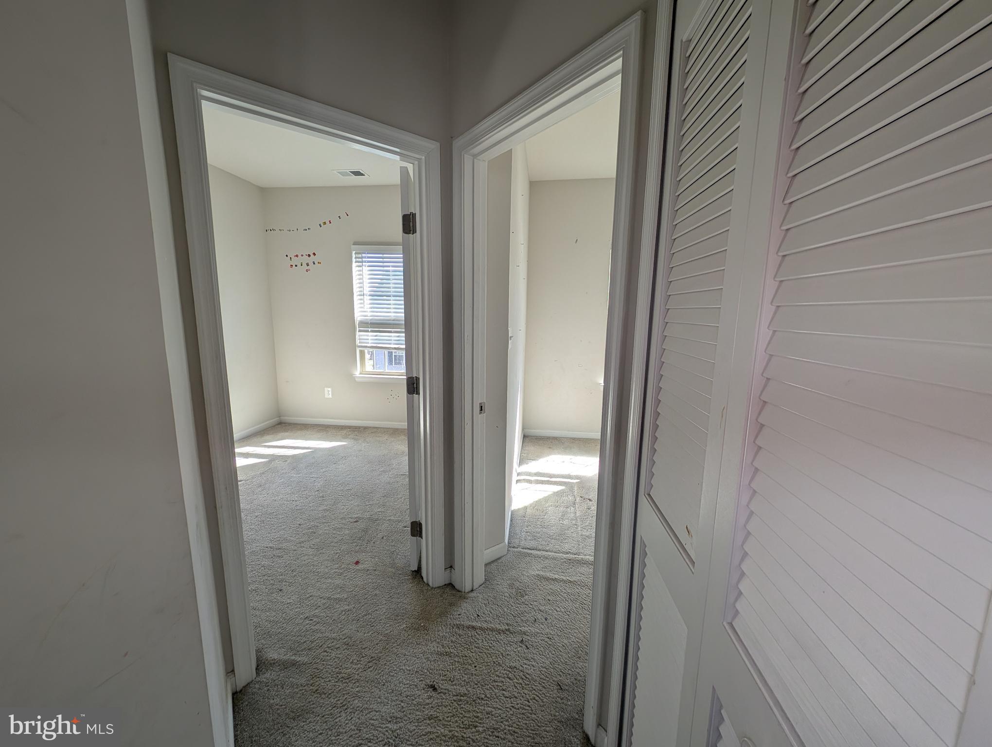 10018 Sandy Run Road Middle River, MD 21220 - Photo 12 of 17 a view of a bathroom from a hallway