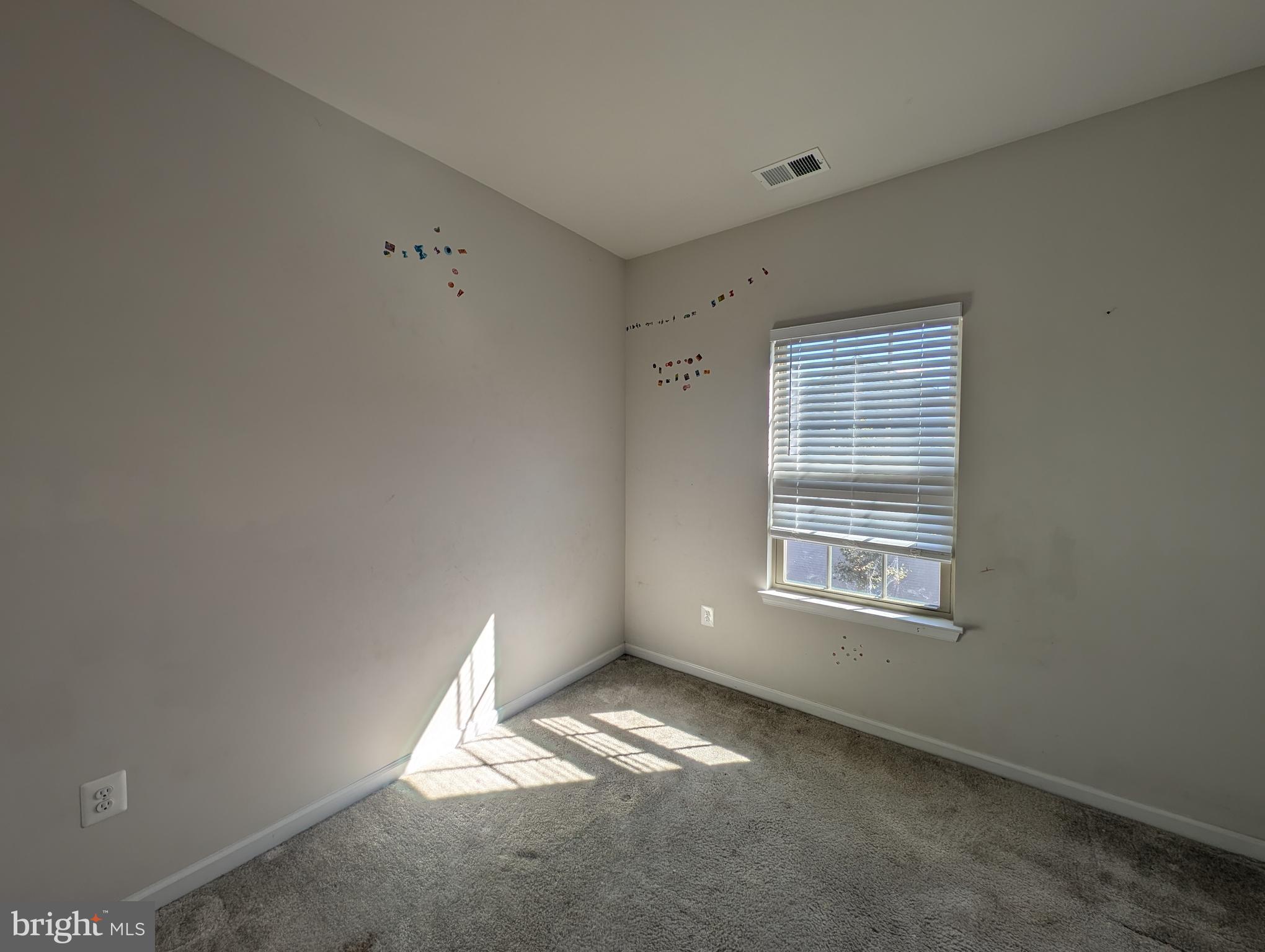 10018 Sandy Run Road Middle River, MD 21220 - Photo 13 of 17 a view of an empty room with a window