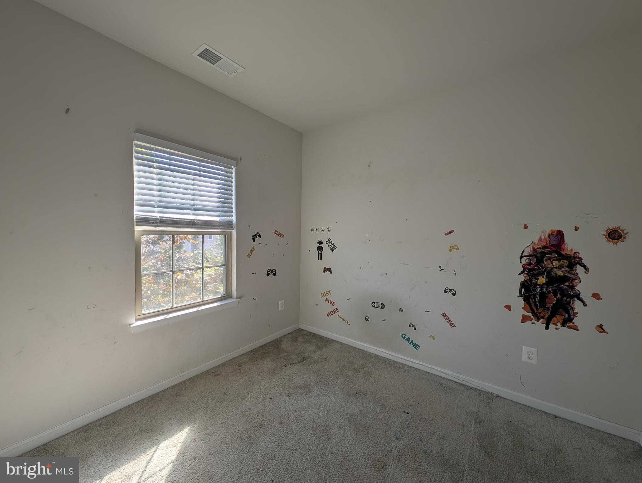 10018 Sandy Run Road Middle River, MD 21220 - Photo 15 of 17 an empty room with a window