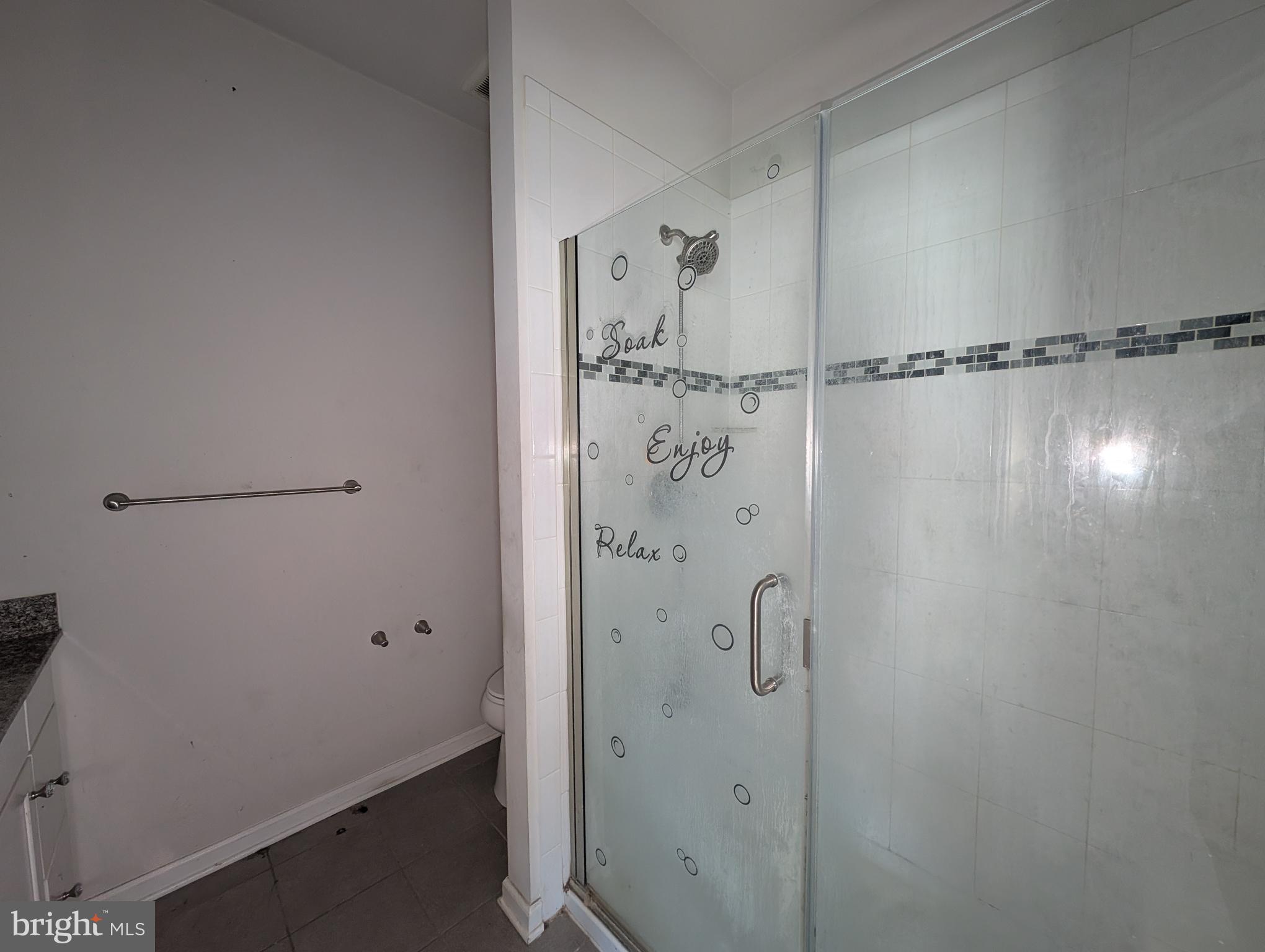 10018 Sandy Run Road Middle River, MD 21220 - Photo 9 of 17 a bathroom with a shower