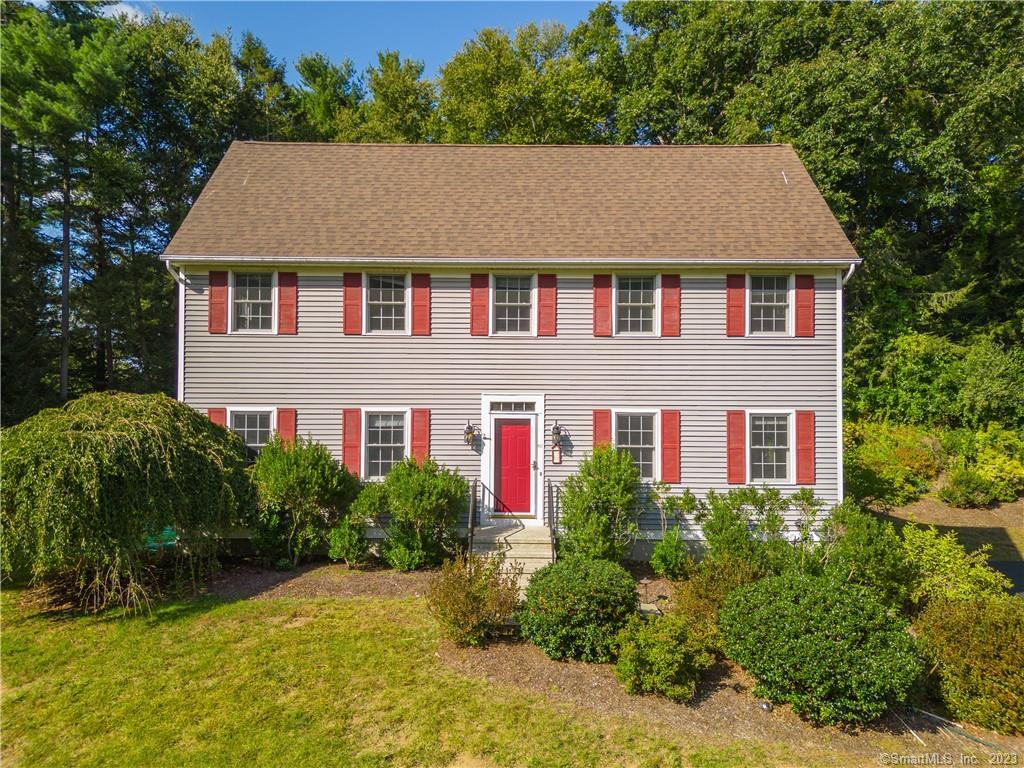 a aerial view of a house yard and green space