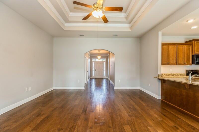 169 Windchime Way Freeport, FL 32439 - Photo 12 of 67 a view of a livingroom with wooden floor
