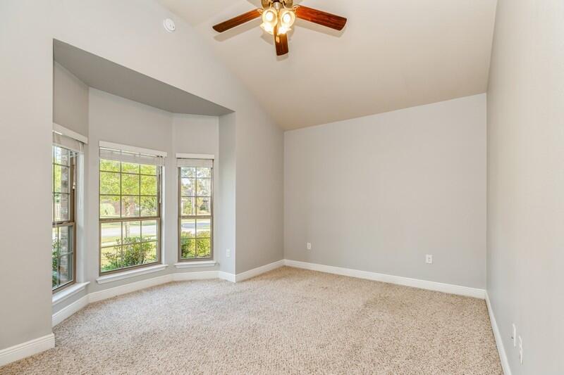 169 Windchime Way Freeport, FL 32439 - Photo 20 of 67 a view of a livingroom with a ceiling fan and window