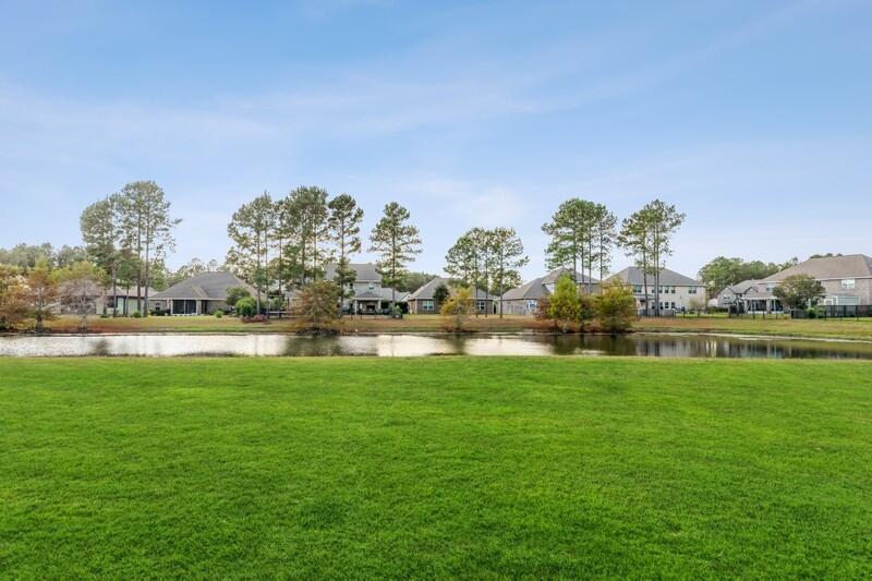 169 Windchime Way Freeport, FL 32439 - Photo 40 of 67 a view of a lake with a big yard