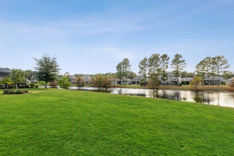 169 Windchime Way Freeport, FL 32439 - Photo 41 of 67 a view of a lake with houses in the back