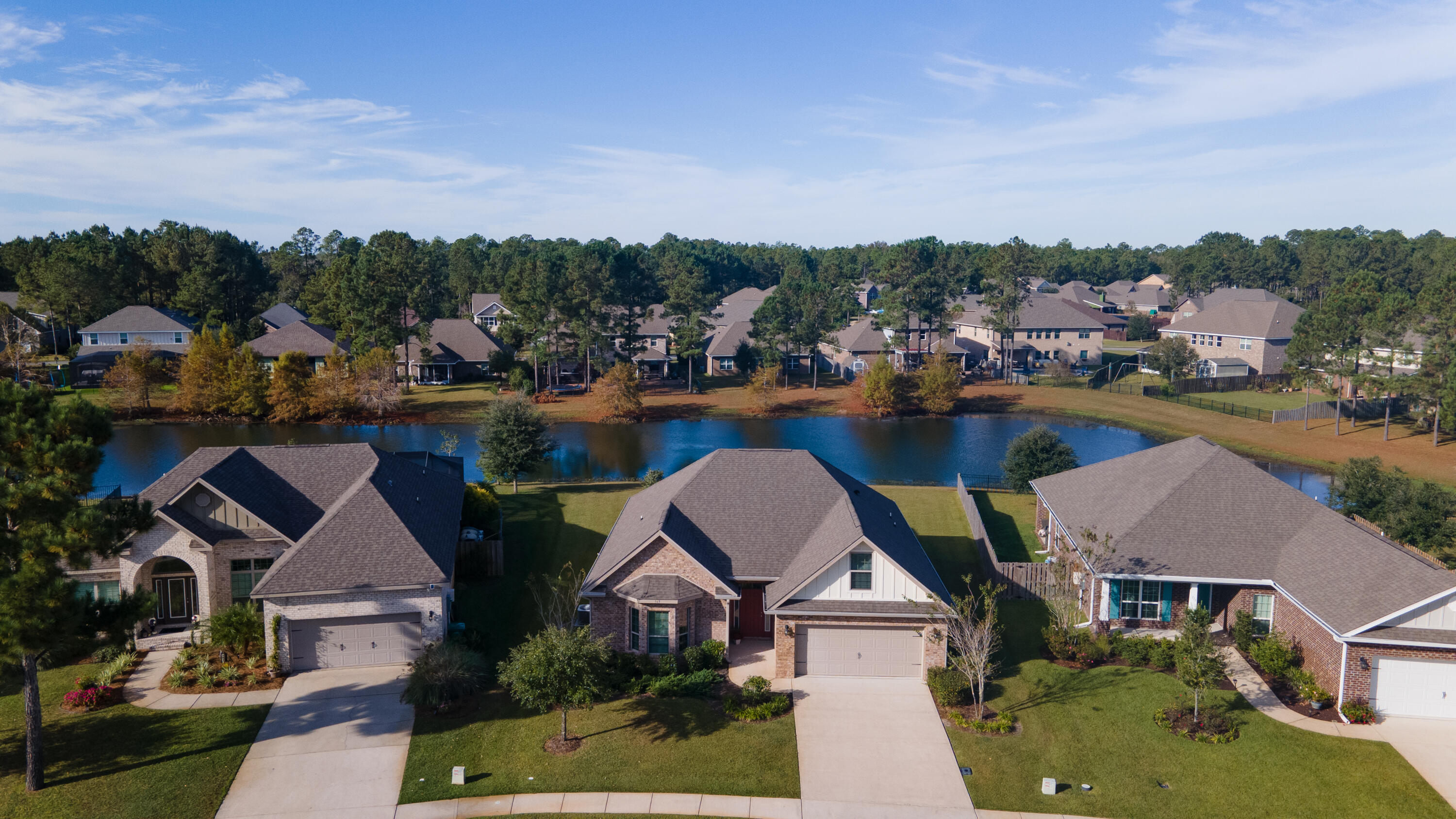169 Windchime Way Freeport, FL 32439 - Photo 47 of 67 an aerial view of a house with outdoor space and lake view in back