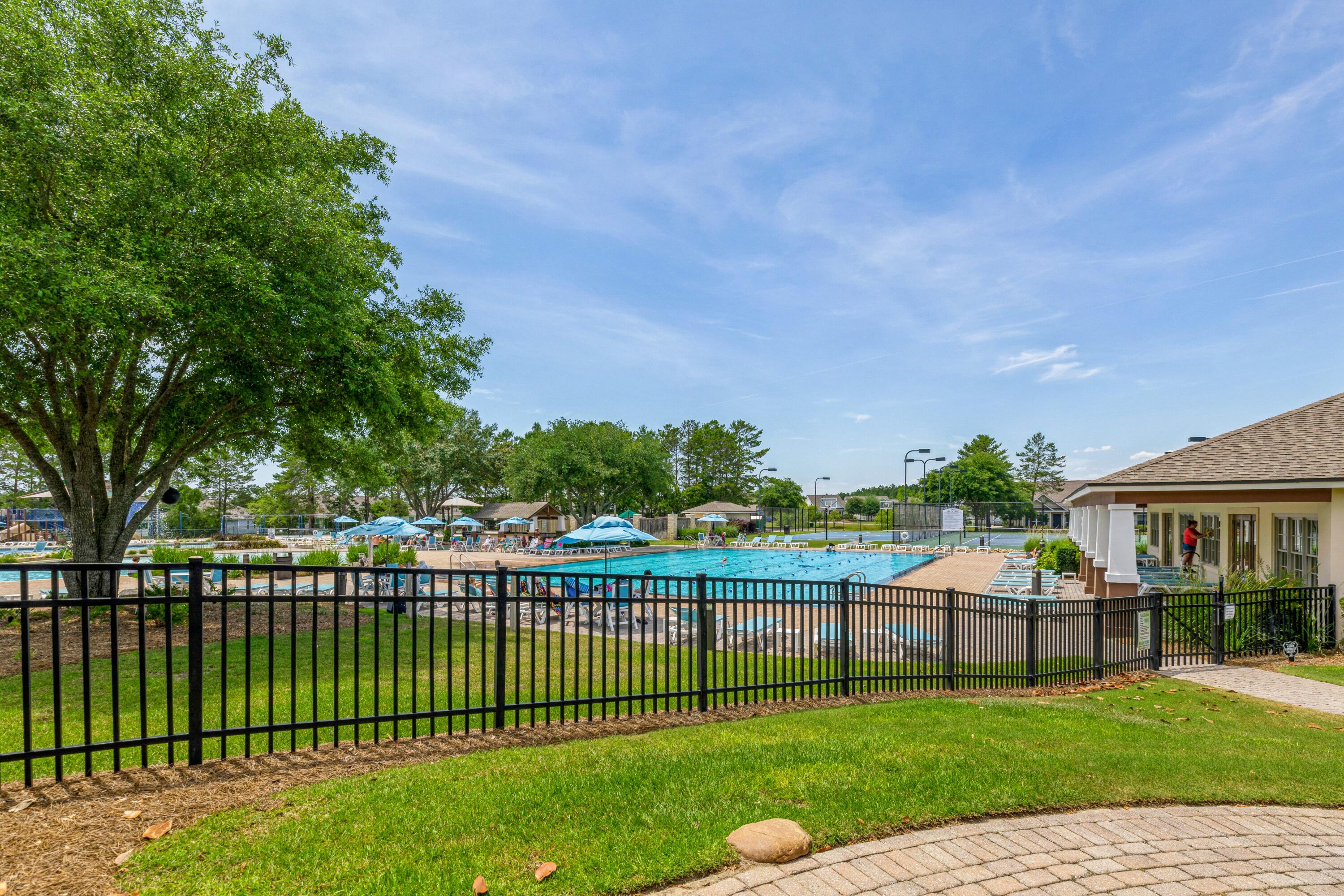 169 Windchime Way Freeport, FL 32439 - Photo 66 of 67 a view of a house with a yard and sitting area