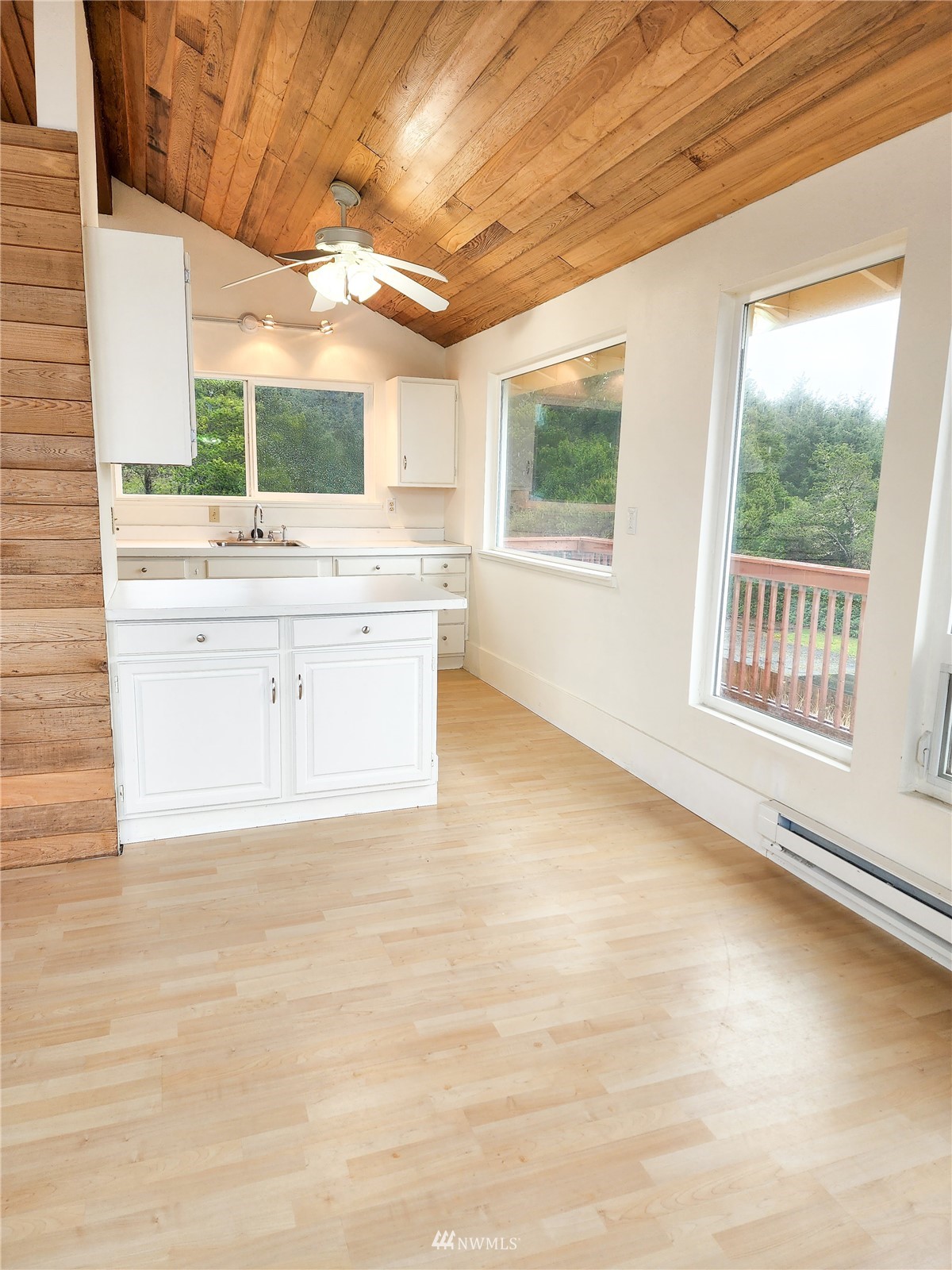 39 Ocean Lane Copalis Beach, WA 98535 - Photo 16 of 21 a view of a kitchen with a sink and a window