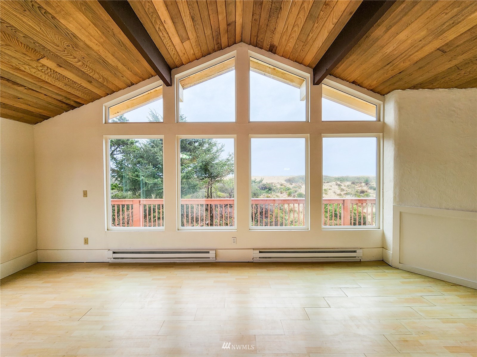 39 Ocean Lane Copalis Beach, WA 98535 - Photo 6 of 21 a view of an empty room with a window