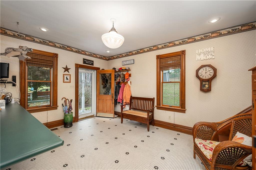 227 Aggas Road West Sunbury, PA 16061 - Photo 17 of 50 a bedroom with furniture and a window