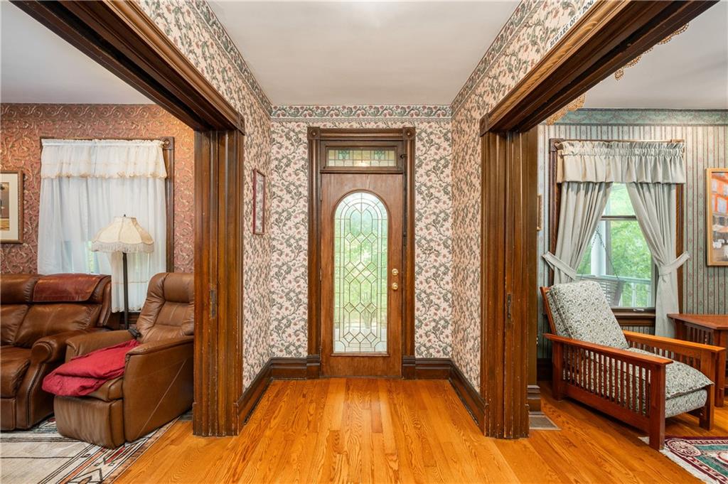 227 Aggas Road West Sunbury, PA 16061 - Photo 25 of 50 a living room with furniture and a window