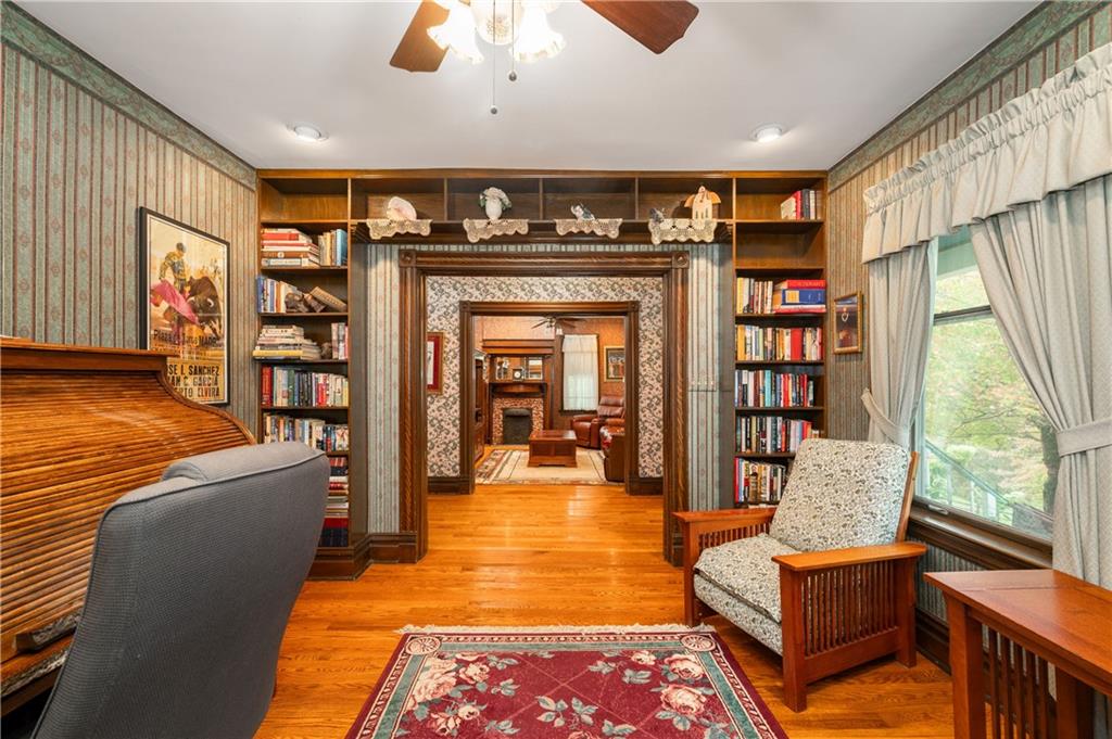 227 Aggas Road West Sunbury, PA 16061 - Photo 27 of 50 a living room with furniture and a large window
