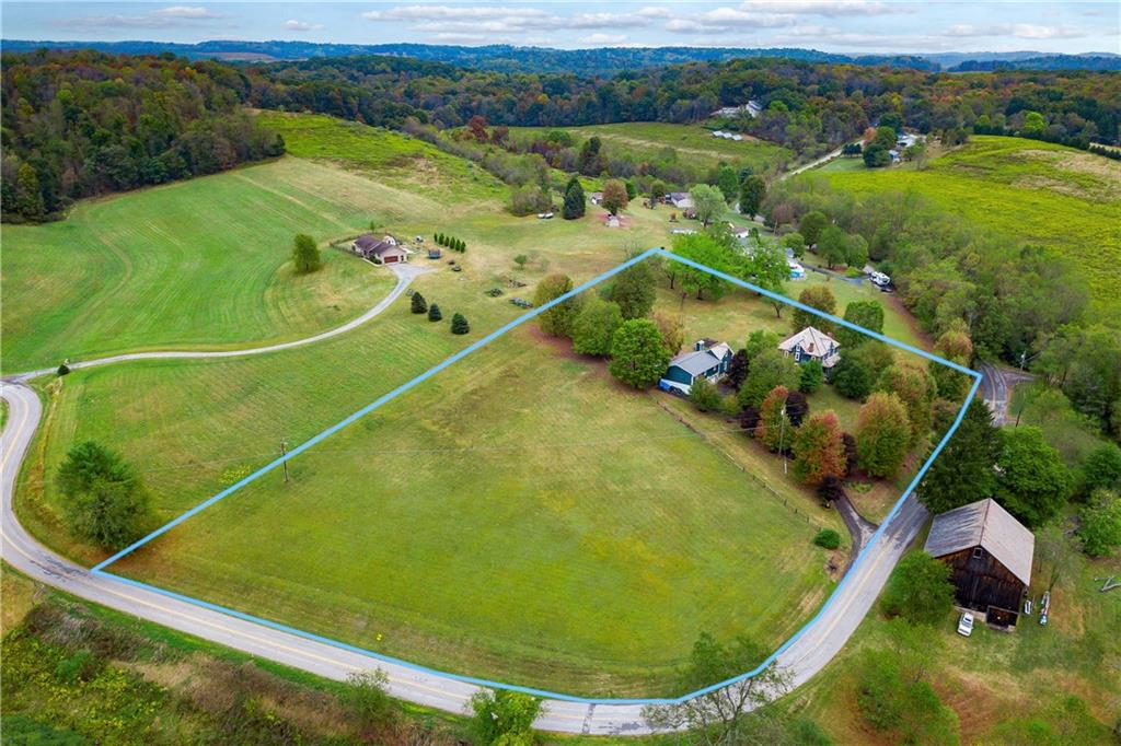 227 Aggas Road West Sunbury, PA 16061 - Photo 50 of 50 a view of a swimming pool and mountain