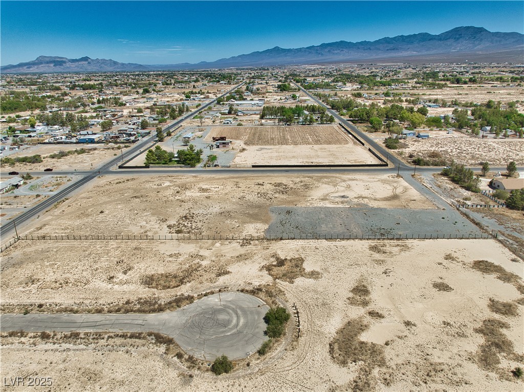 2081 Manse Road Pahrump, NV 89048 - Photo 13 of 18 View of rural area featuring a mountainous background and a desert landscape