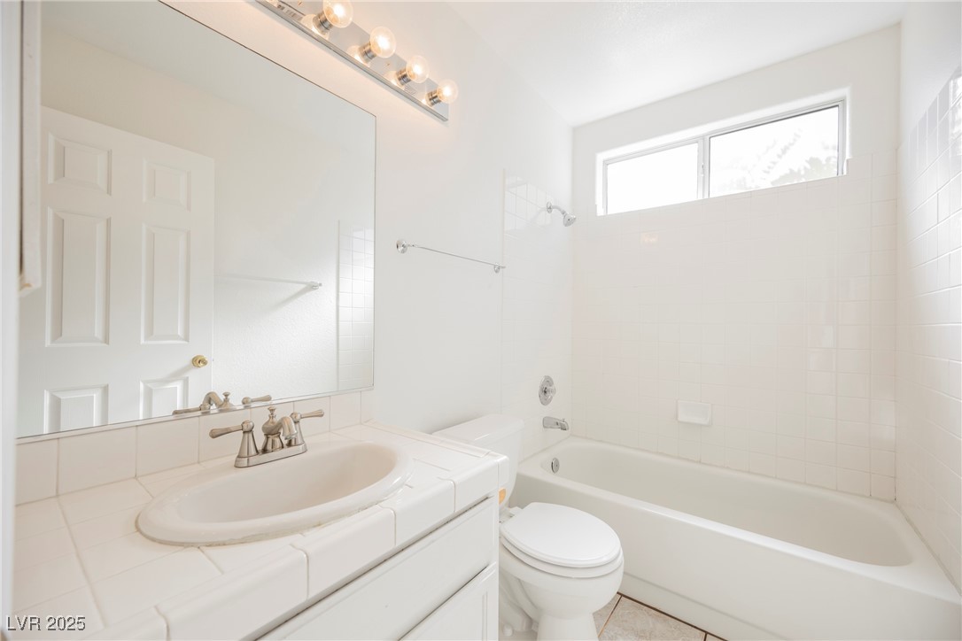 179 Grayce Mesquite, NV 89027 - Photo 13 of 25 Bathroom with vanity and tub / shower combination