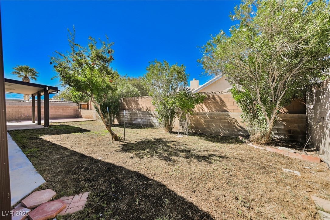 179 Grayce Mesquite, NV 89027 - Photo 18 of 25 Fenced backyard with a patio