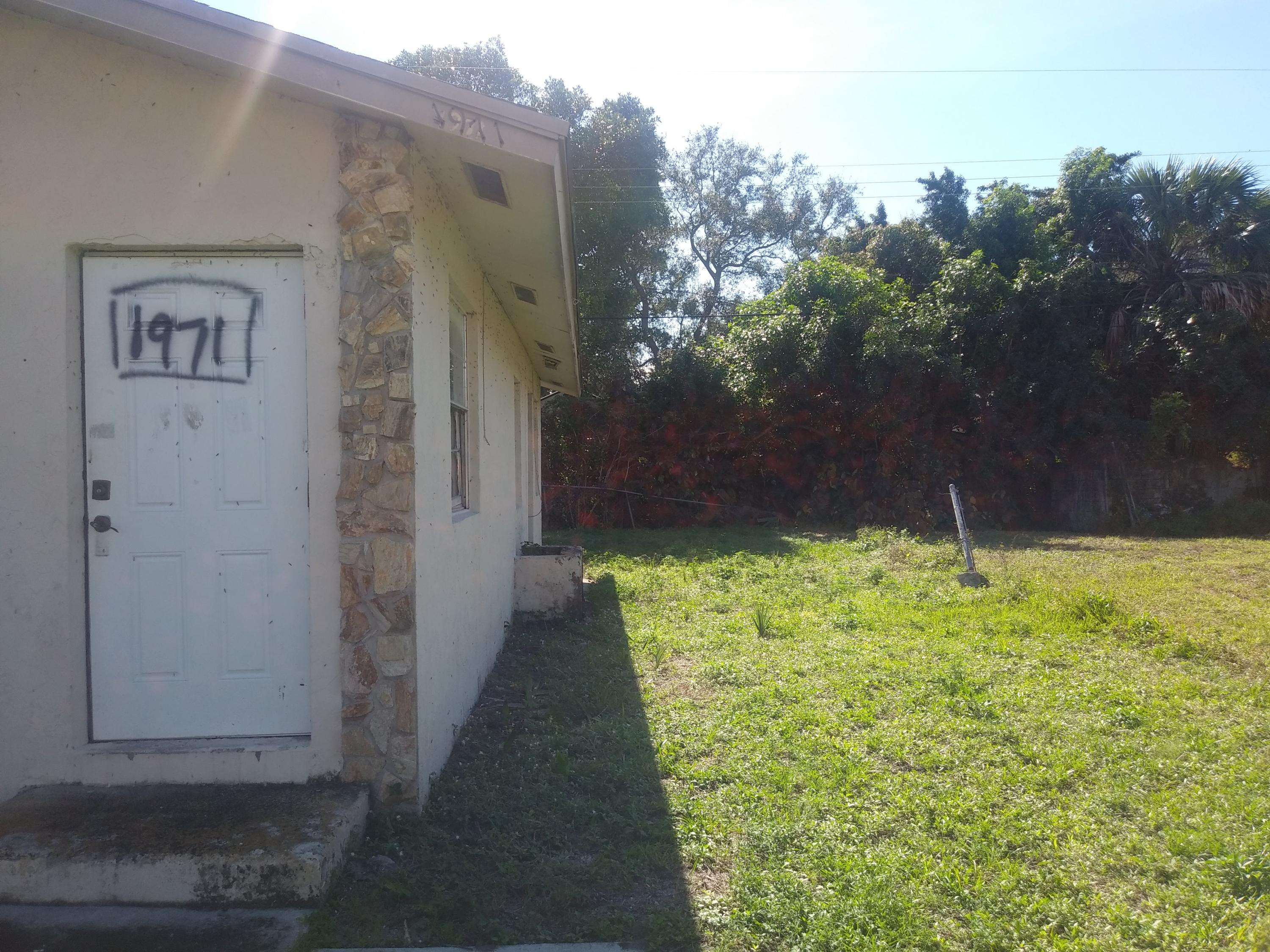 1971 West 13th Street Riviera Beach, FL 33404 - Photo 2 of 14 side view (2)