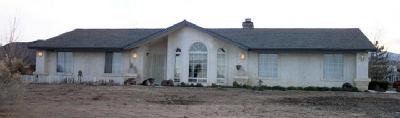 4875 Arrowhead Road, Unit 103 Phelan, CA 92371 - Photo 1 of 1 Full Frontal View. Garage is to the right of the home.