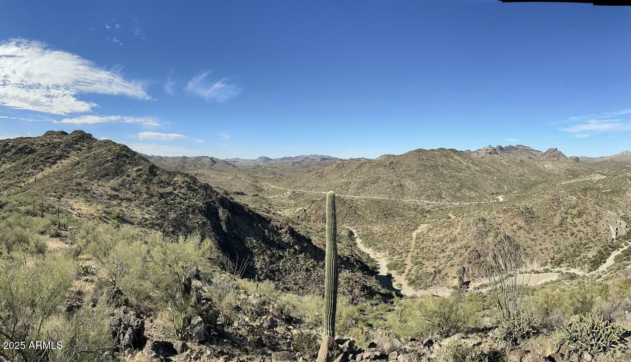 0 South Burro Pass Road, Unit 76 Morristown, AZ 85342 - Photo 2 of 18 a view of a large mountain with mountains in the background