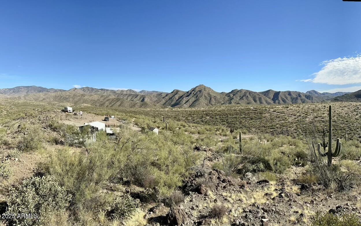 0 South Burro Pass Road, Unit 76 Morristown, AZ 85342 - Photo 3 of 18 a view of a mountain in the distance