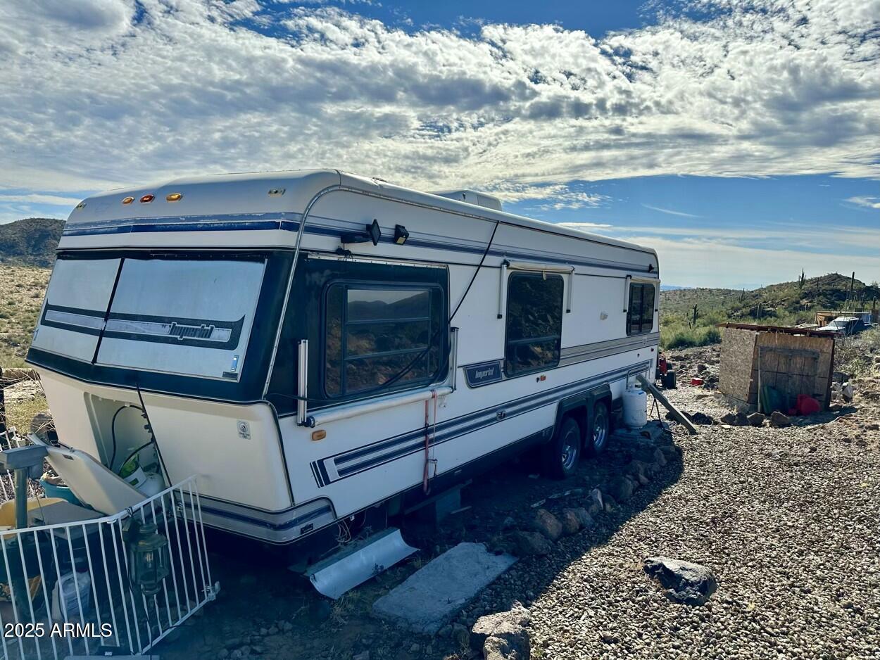 0 South Burro Pass Road, Unit 76 Morristown, AZ 85342 - Photo 10 of 18 a view of deck with patio