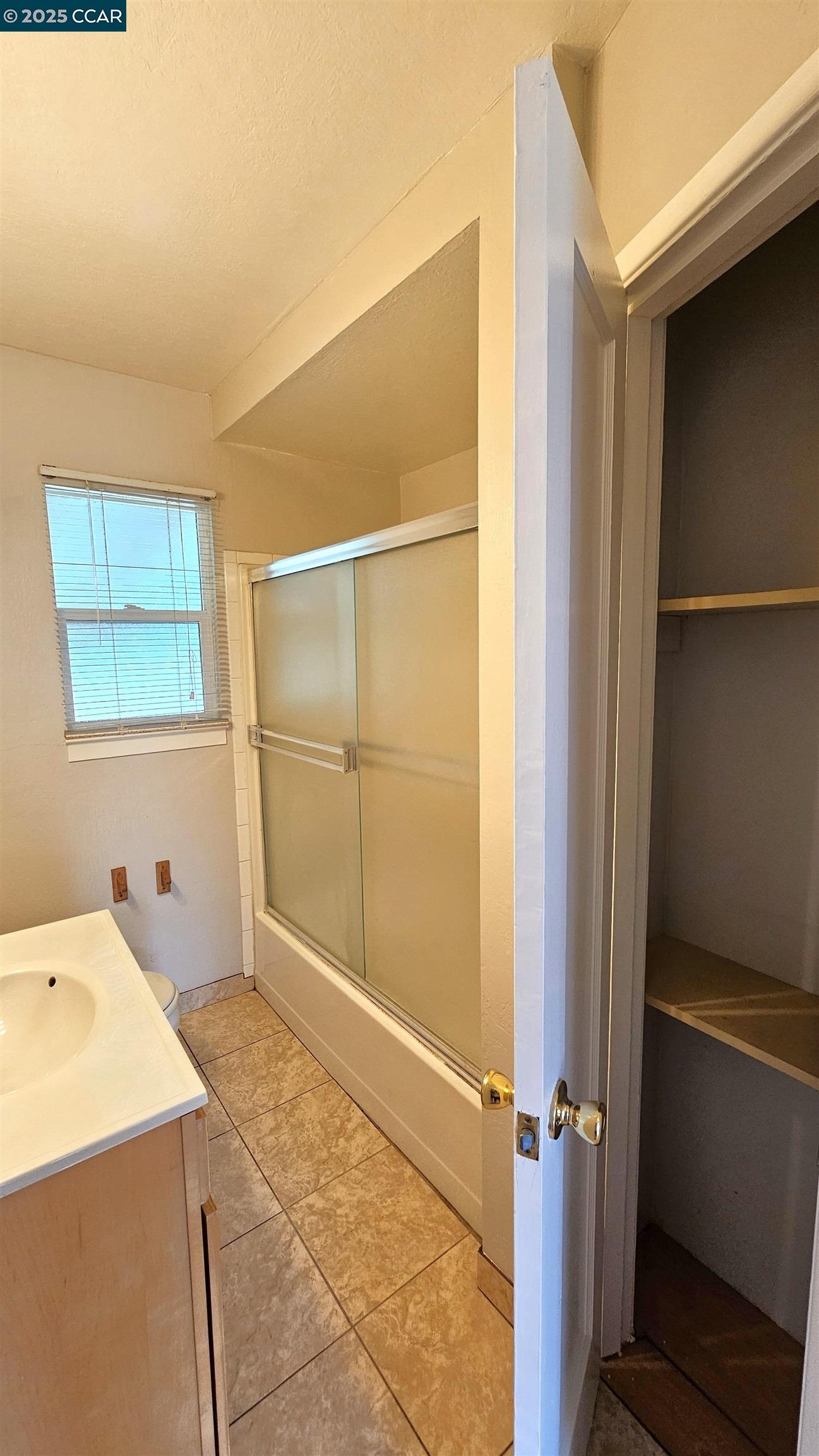 2475 Maple Avenue Concord, CA 94520 - Photo 20 of 28 a bathroom with a sink and a shower