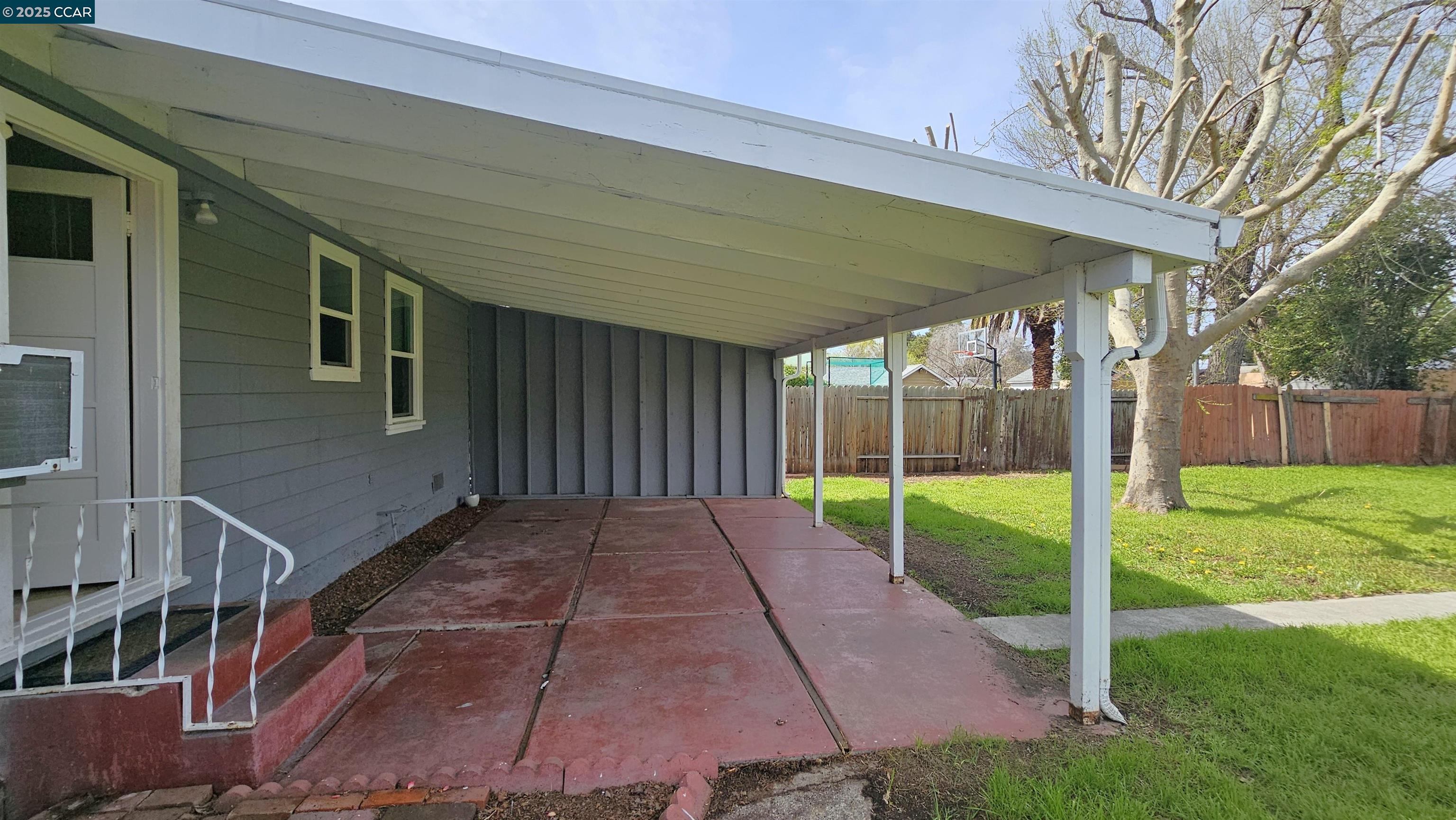 2475 Maple Avenue Concord, CA 94520 - Photo 22 of 28 a view of a backyard with wooden fence