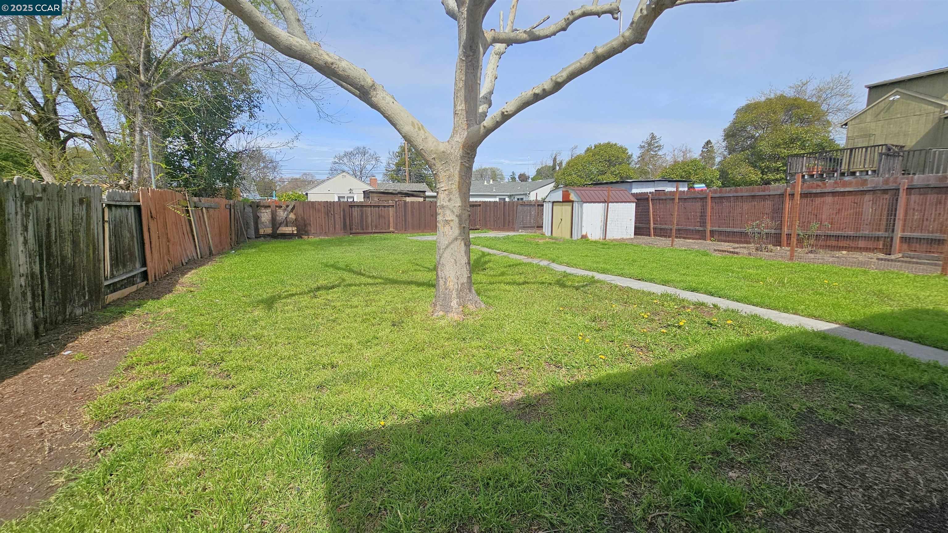 2475 Maple Avenue Concord, CA 94520 - Photo 25 of 28 a view of a garden with a slide