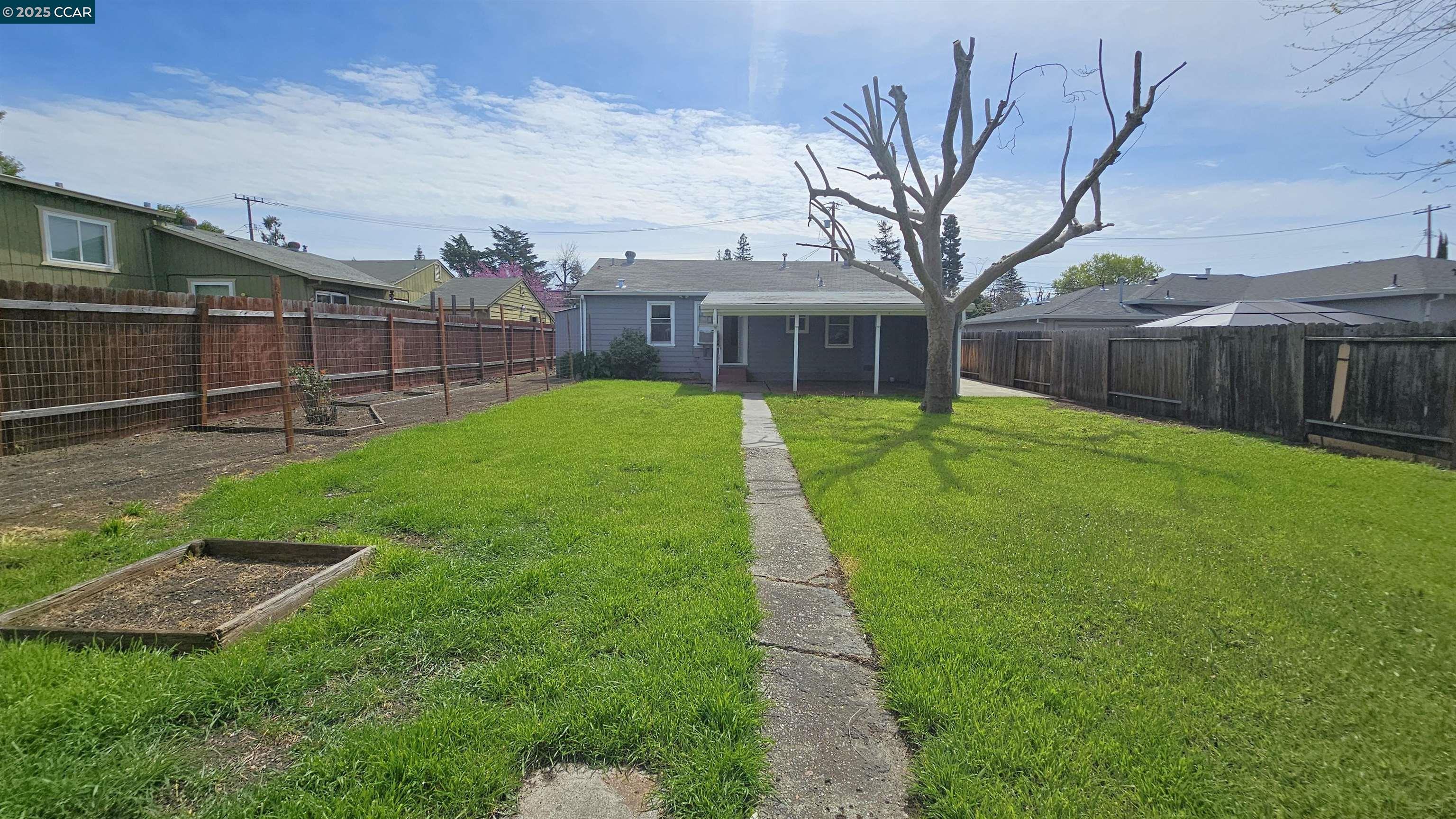2475 Maple Avenue Concord, CA 94520 - Photo 28 of 28 a backyard of a house with lots of green space