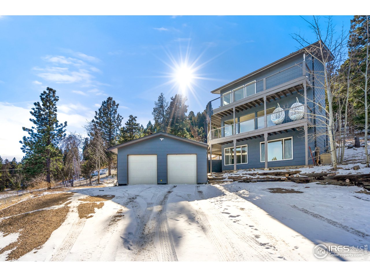 11581 Inspiration Road Golden, CO 80403 - Photo 3 of 40 a view of a building with a street