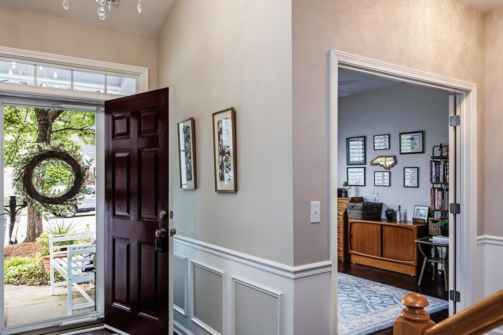 10425 Dapping Drive Raleigh, NC 27614 - Photo 6 of 32 a living room with furniture and a window