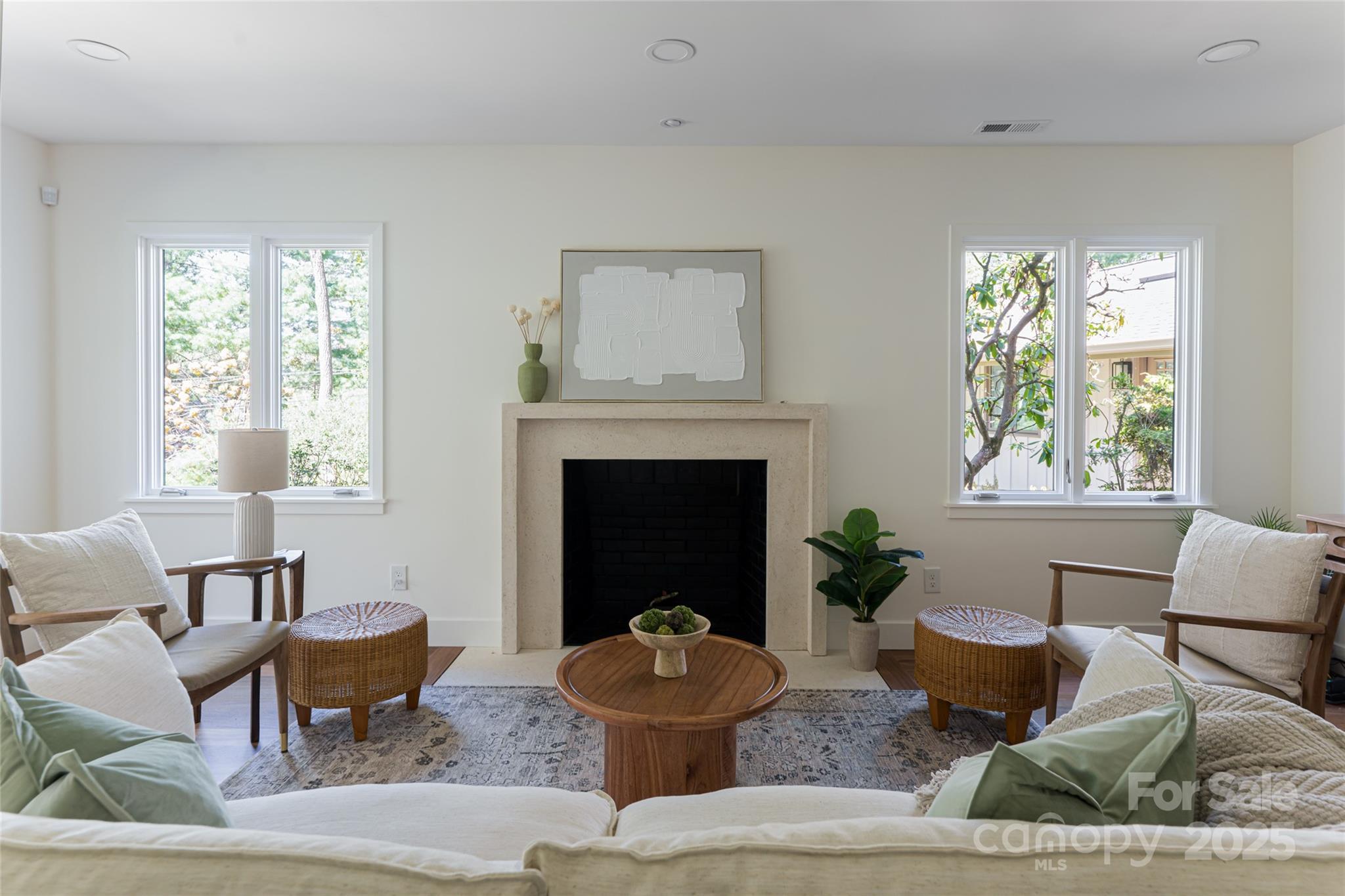 5 Holly Hill Road Asheville, NC 28803 - Photo 16 of 33 a living room with furniture and a fireplace