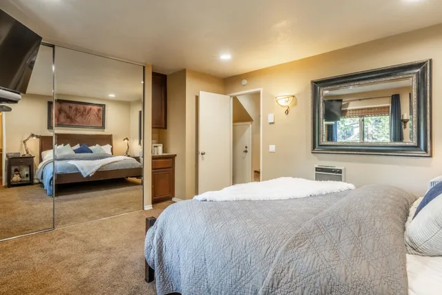 a spacious bathroom with a tub and sink
